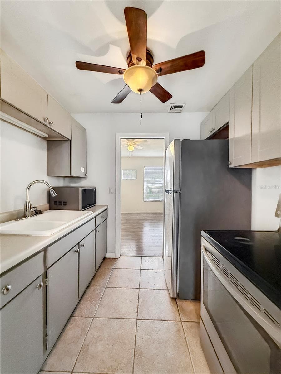 Single Family Residence at 889 W VILLAGE DR, DELTONA, photo 8 of 29