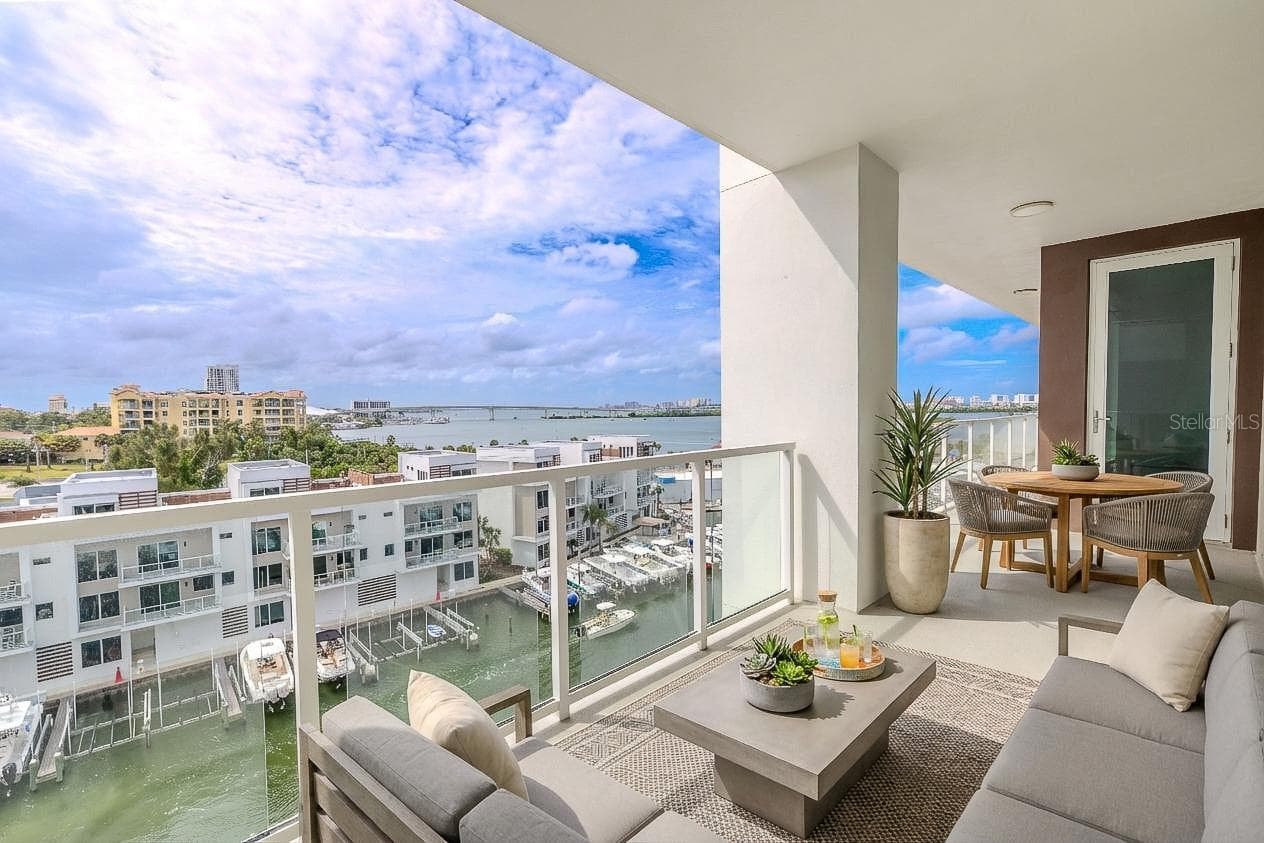 Step onto your private balcony and take in breathtaking views of the Intracoastal Waterway, where shimmering waters meet the skyline of Clearwater. From this elevated vantage point, you’ll enjoy a sweeping panorama that includes both the iconic Memorial Causeway and Sand Key Bridge—each beautifully illuminated at night for a dazzling display. - 920 N OSCEOLA AVE #703, CLEARWATER