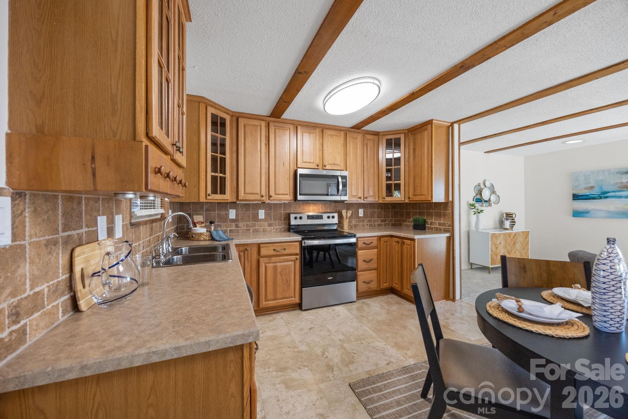 Open floor plan. View from kitchen into the living area. - 4278 Harbor Lane, Sherrills Ford
