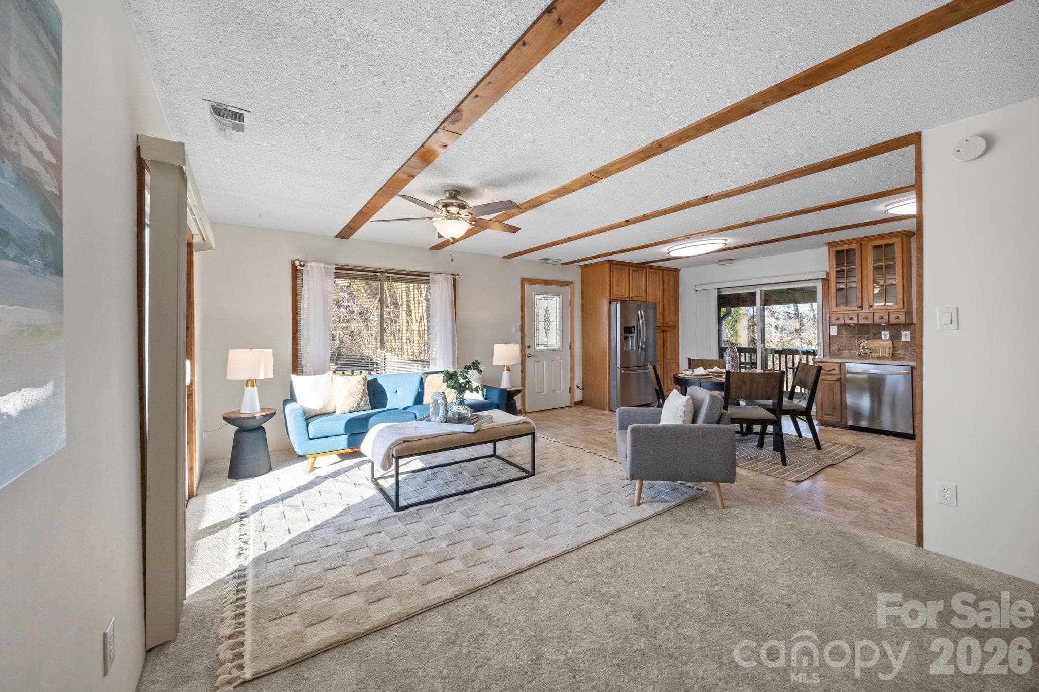 Another view of the open floor plan - great for entertaining or relaxing! Beautiful lake views and natural light galore! - 4278 Harbor Lane, Sherrills Ford