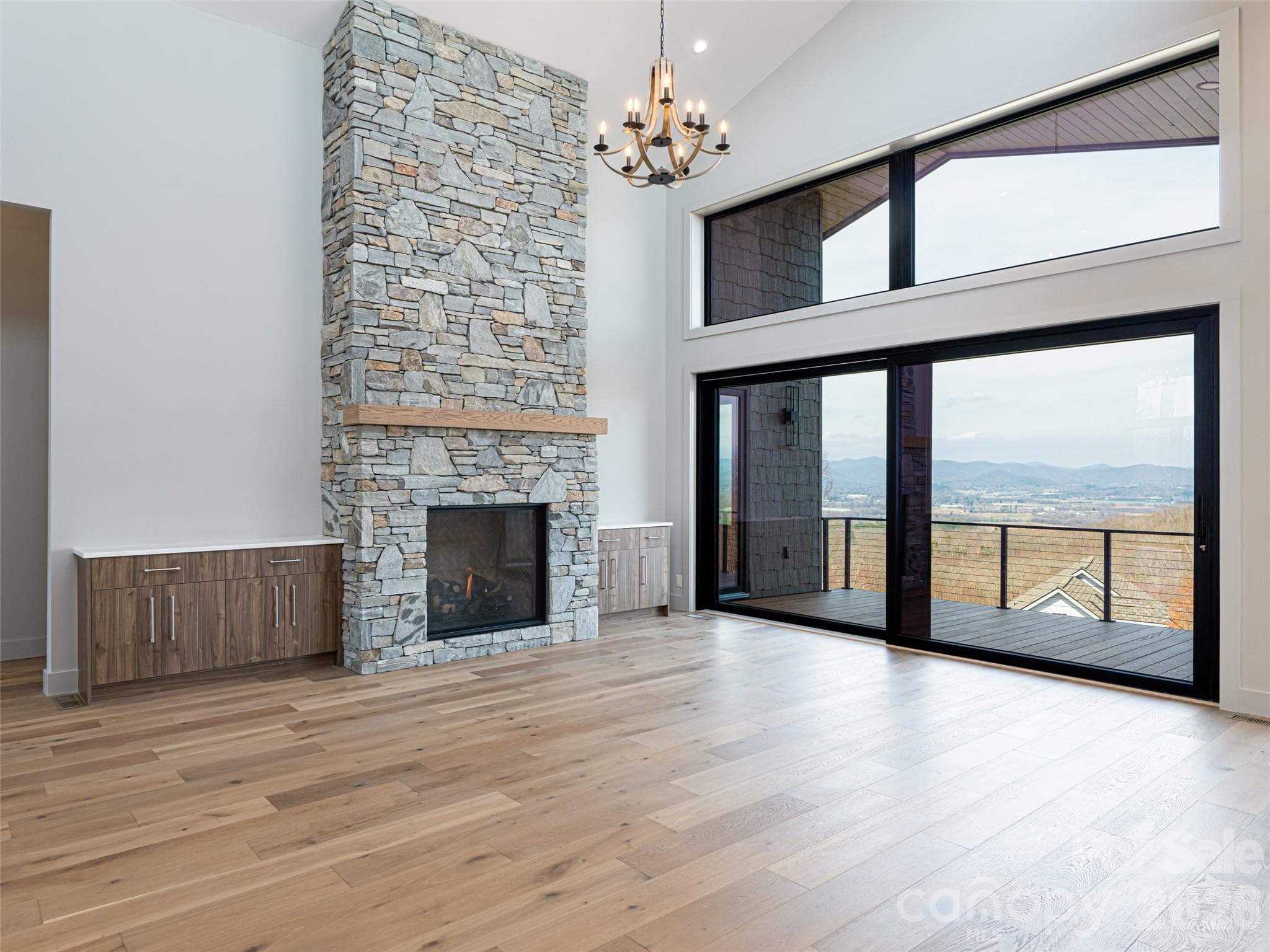 Family Room with Floor to Ceiling Stacked Stone Natural Gas Fireplace - 247 Coachman Drive, Hendersonville