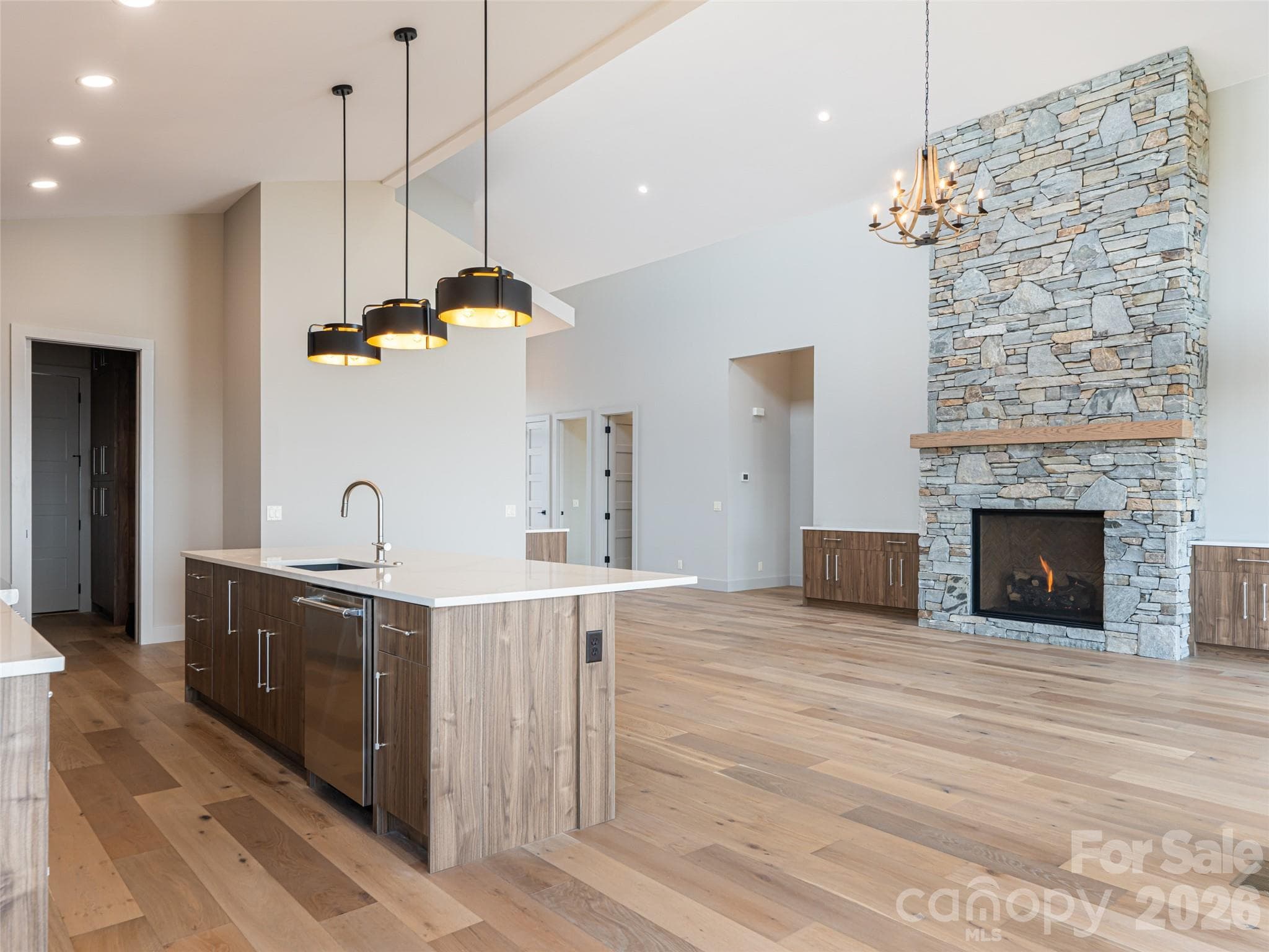 Kitchen Island and Family Room as seen from Dining Room - 247 Coachman Drive, Hendersonville
