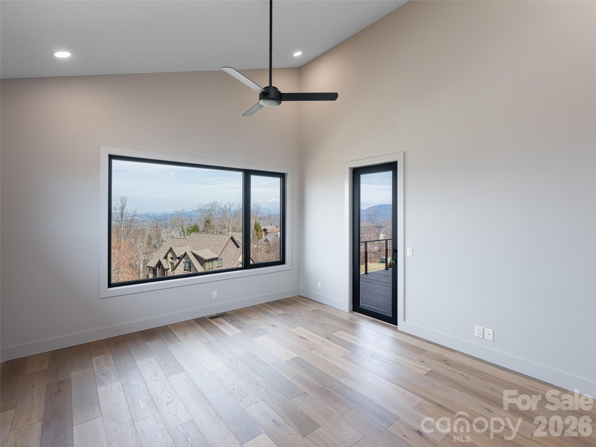 Primary Bedroom with Great Views & exterior door to main level deck - 247 Coachman Drive, Hendersonville
