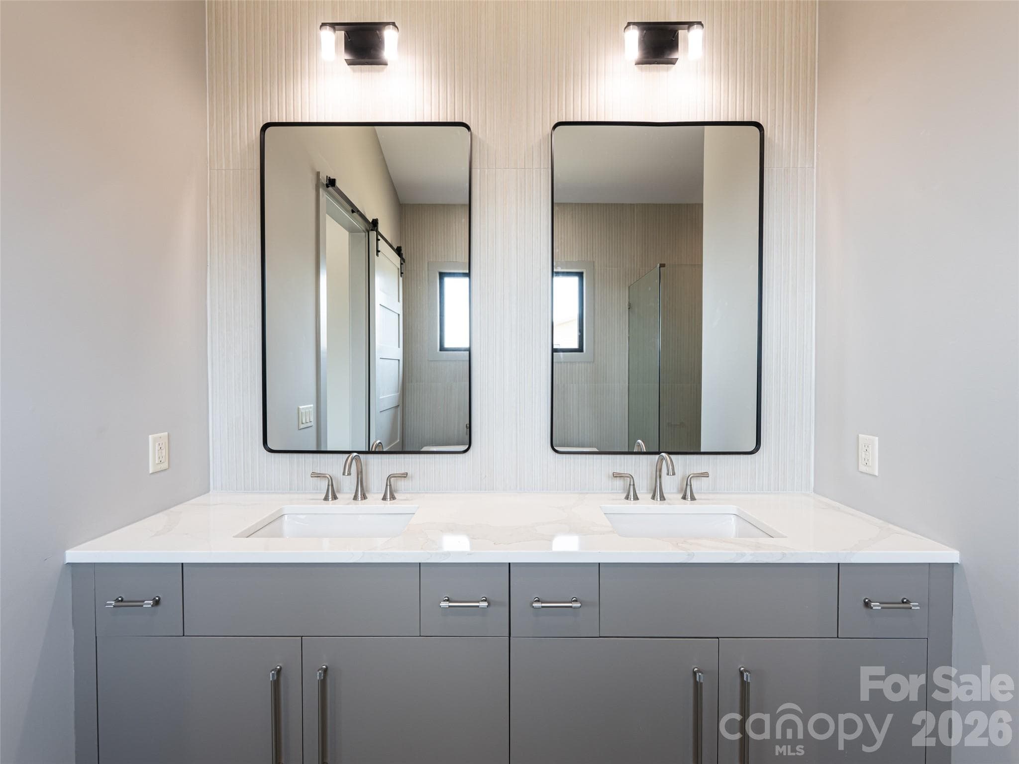 Double Vanity Sinks in Primary Bathroom - 247 Coachman Drive, Hendersonville