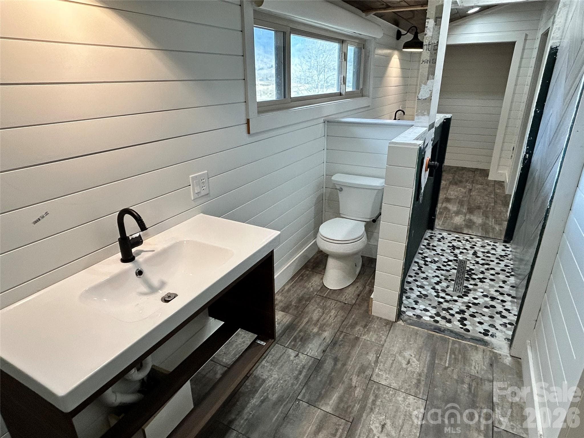 Unfinished shared guest bathrooms - 330 Potts Drive, Waynesville