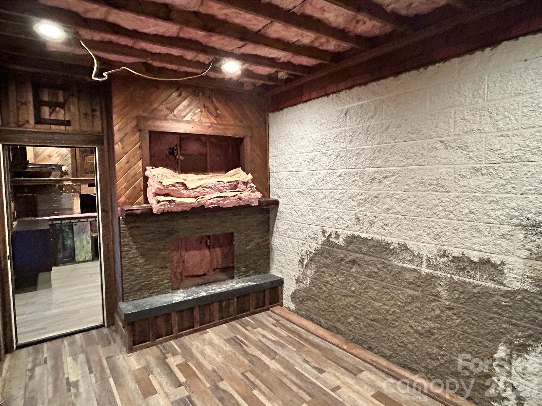 Unfinished gas fireplace room in basement - 330 Potts Drive, Waynesville