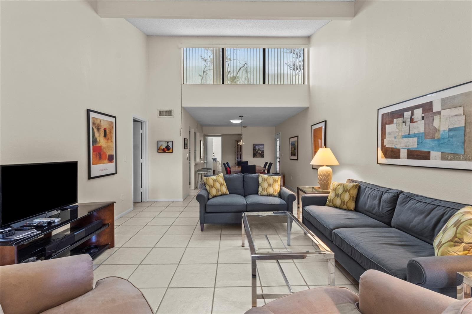 Living Room with clerestory windows - 1633 BOATHOUSE CIR #232, SARASOTA