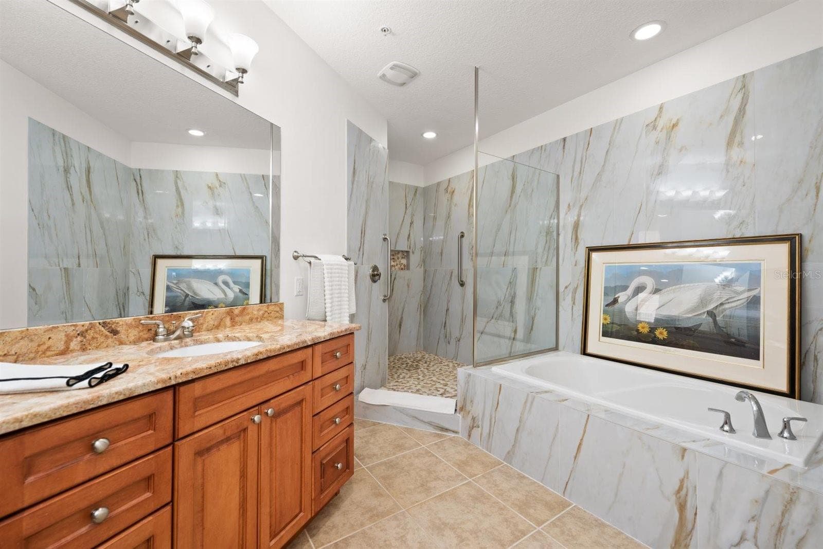 walk-in shower w/new tile walls - 1030 BELLASOL WAY #3201, APOLLO BEACH