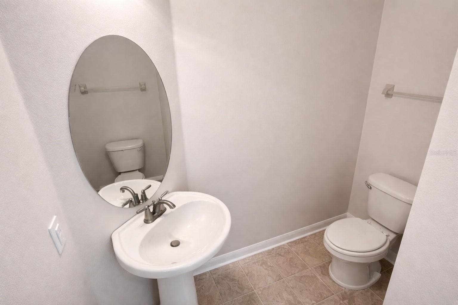 first floor half bath - 1187 CHERVIL DR, POINCIANA
