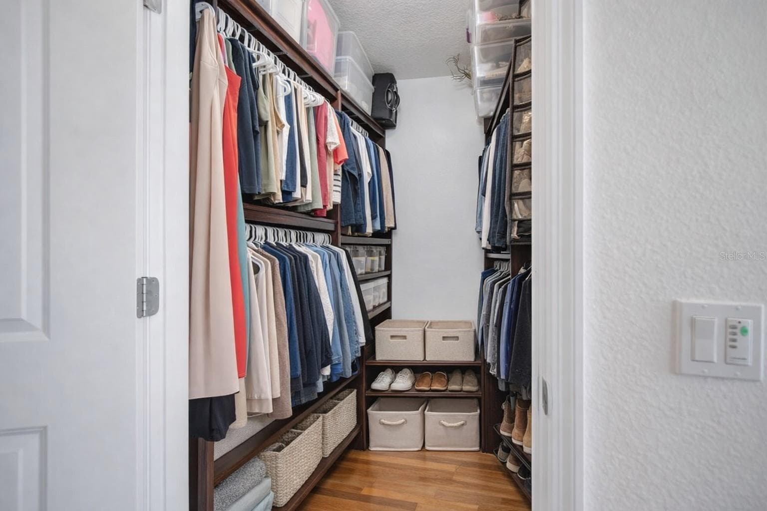 Primary Closet with custom built-ins - 322 E CENTRAL BLVD #1005, ORLANDO