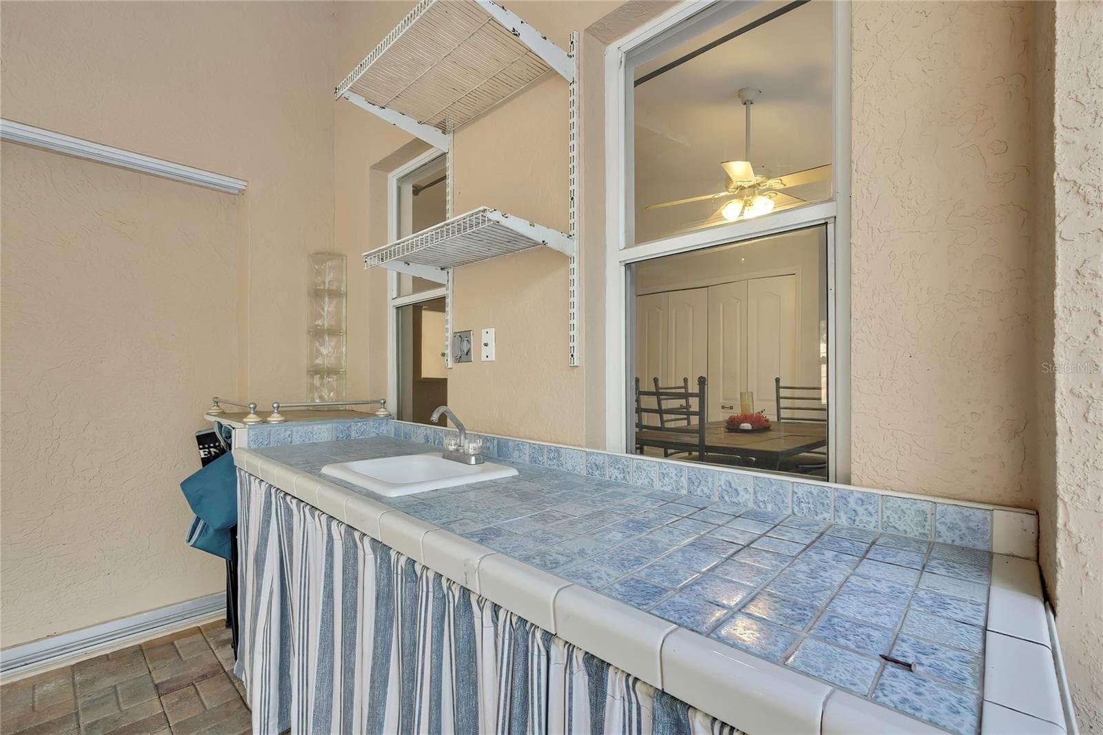 Kitchen area in lanai - 340 E SAVOY ST, LECANTO