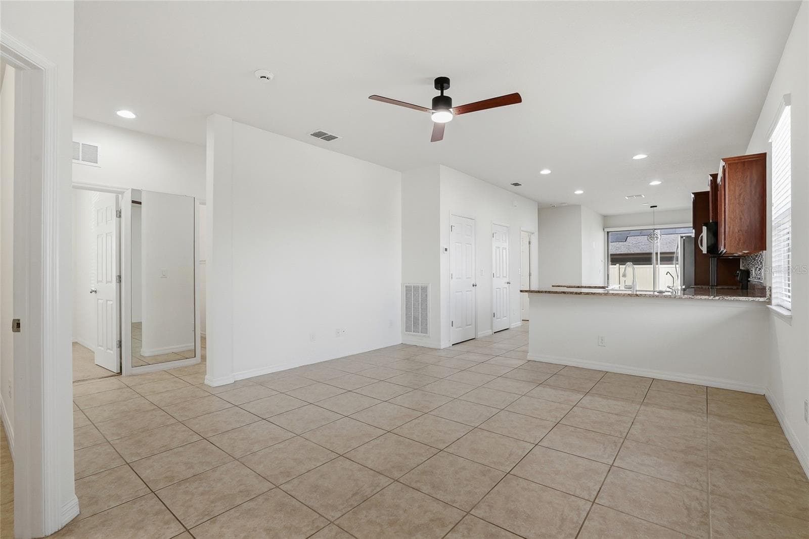 GREAT ROOM (ceramic tile throughout) - 1724 PASSAGE KEY LN, RUSKIN