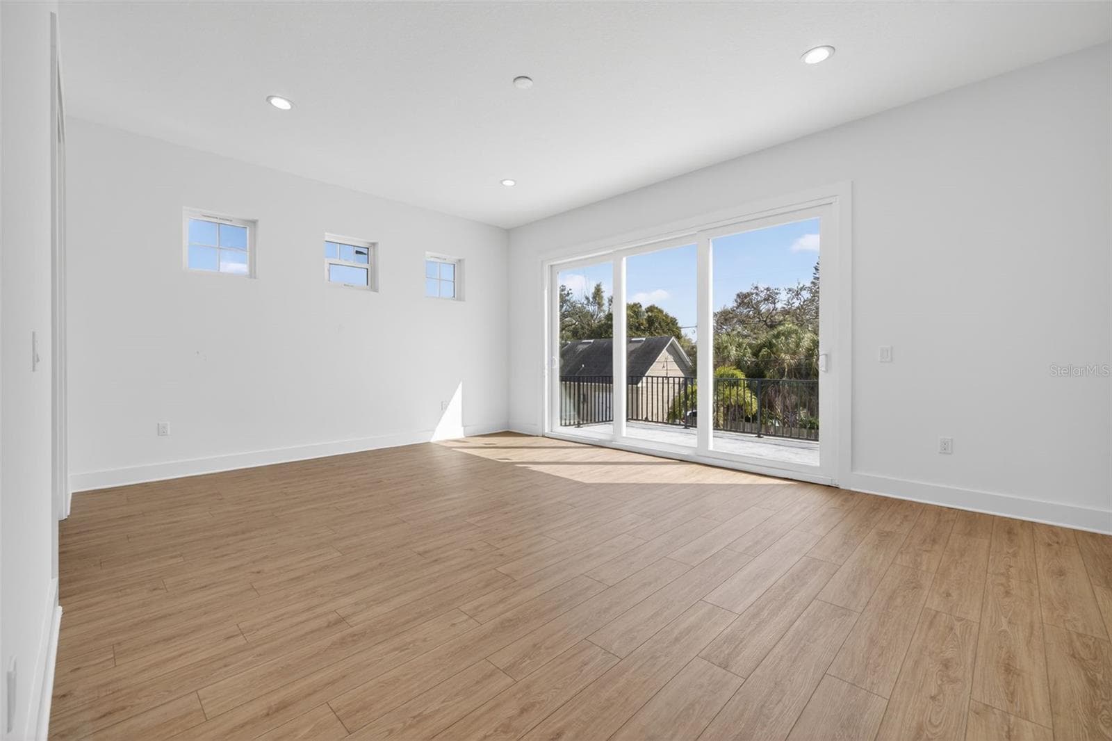 Primary suite with cascading sliders leading to patio deck - 842 30TH AVE, ST PETERSBURG