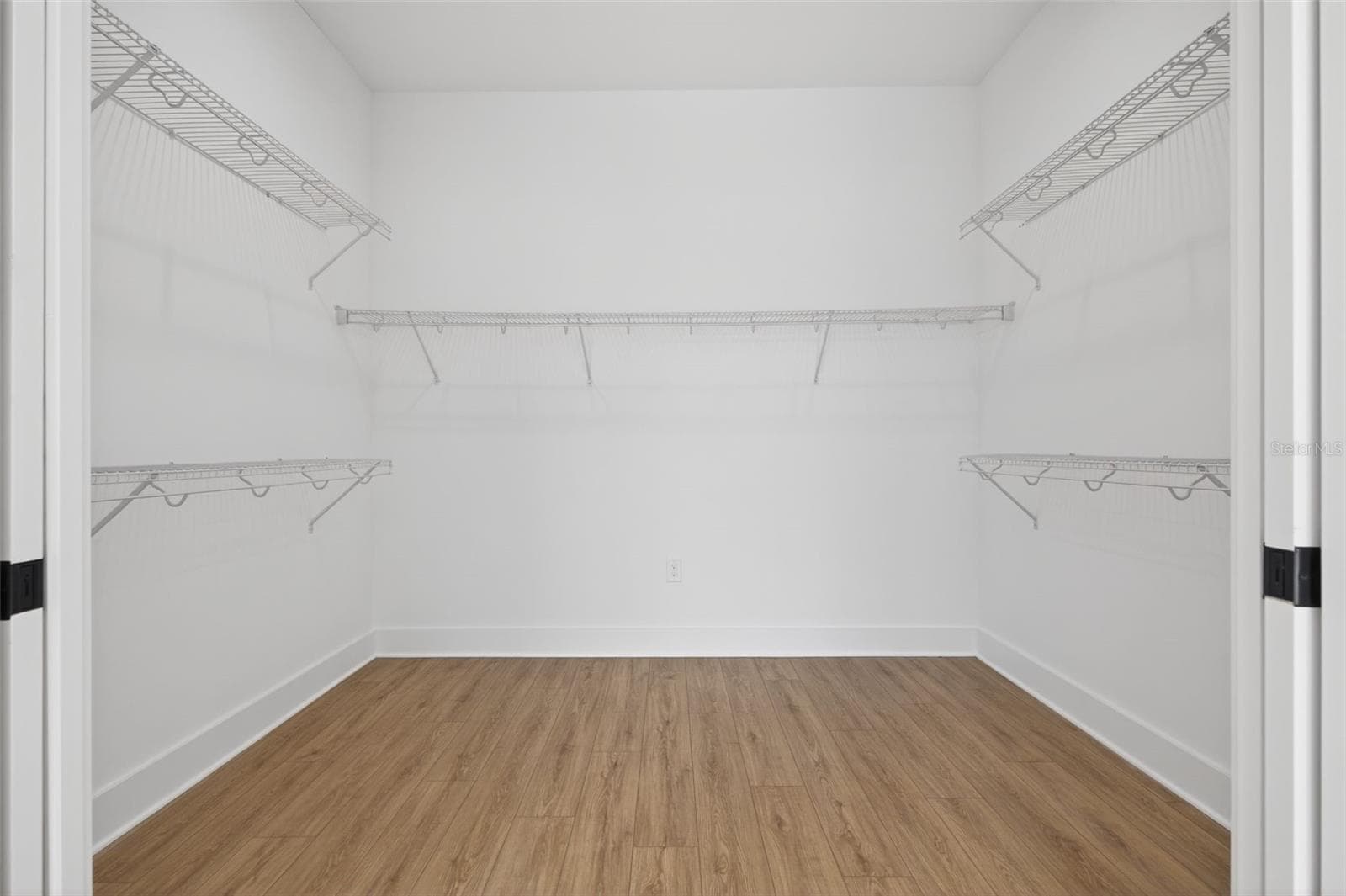 Dual sliding pocket doors leading to large walk-in closet - 842 30TH AVE, ST PETERSBURG