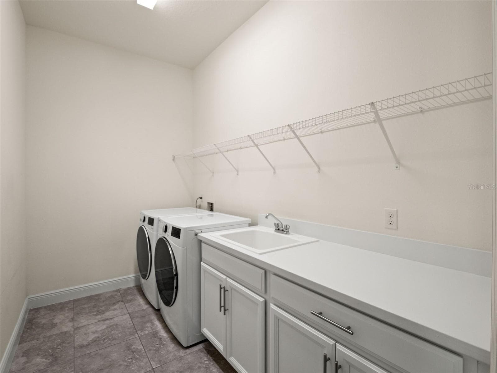 First floor laundry room - 12515 BOVET AVE, ORLANDO