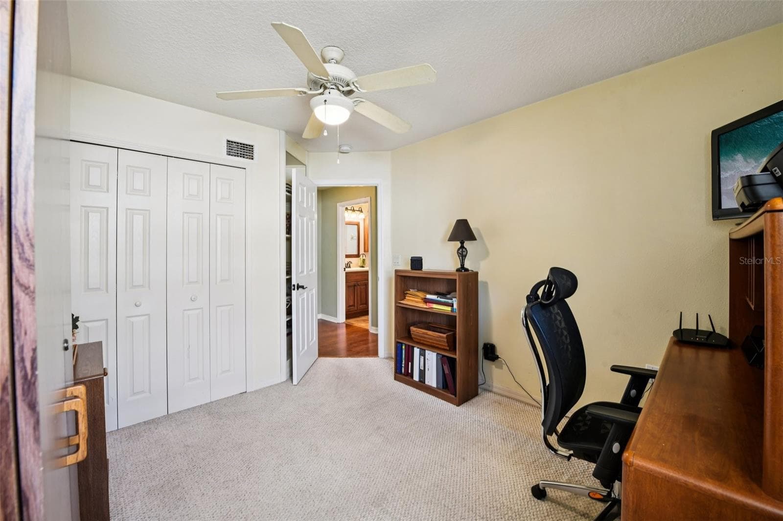 Custom closet and built in shelves behind the door. - 6105 DORY WAY, TAVARES