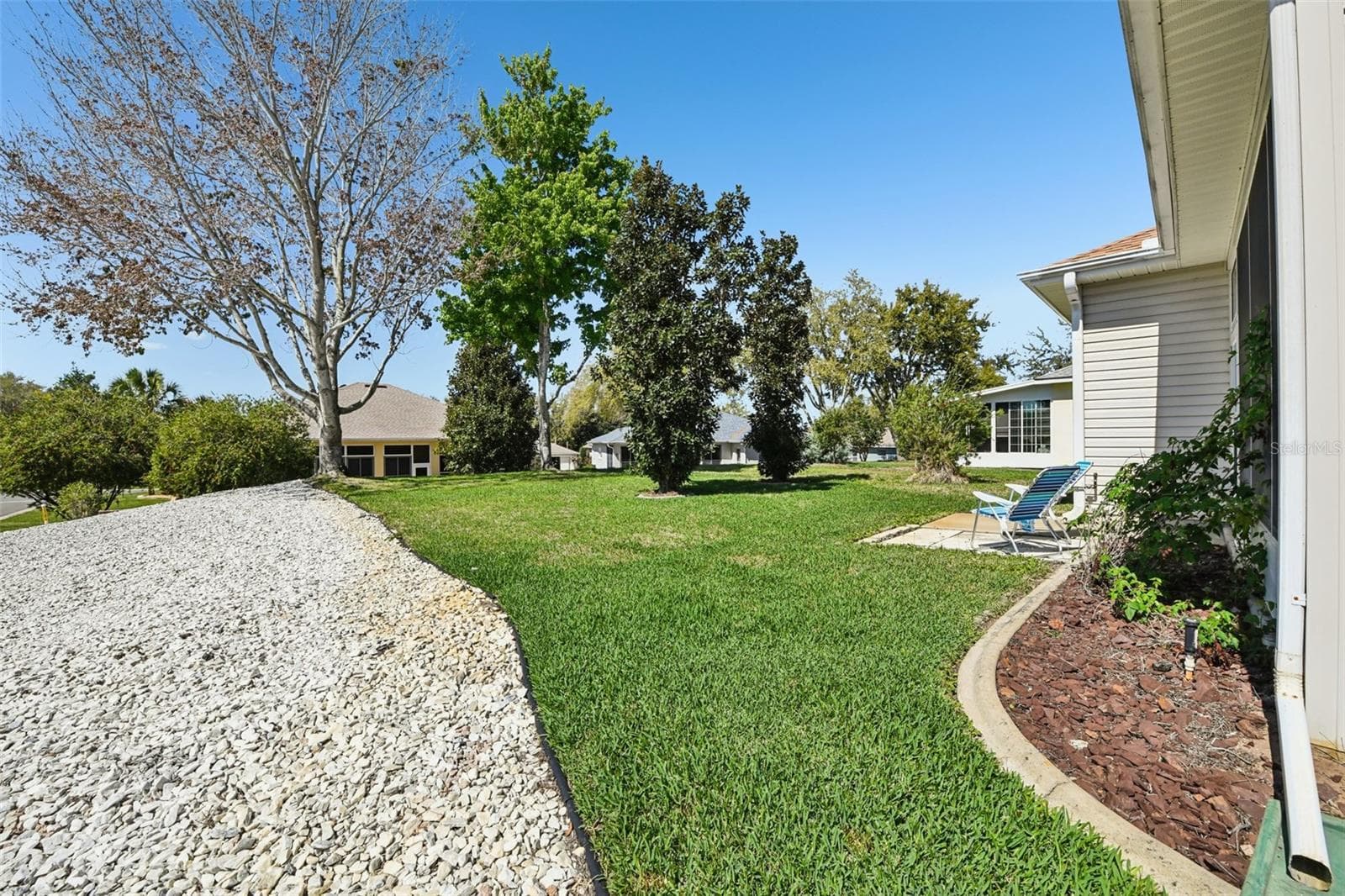Corner lot, privacy and easy maintenance. - 6105 DORY WAY, TAVARES