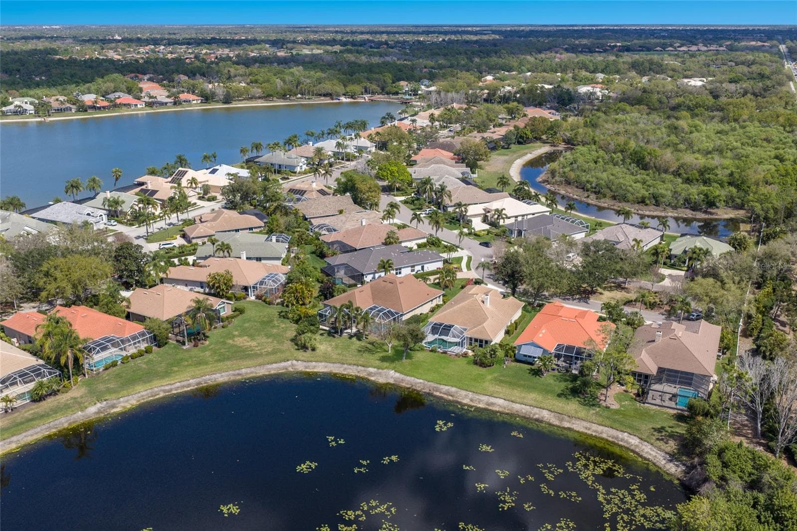 Drone view over home - 8428 MISTY MORNING CT, LAKEWOOD RANCH