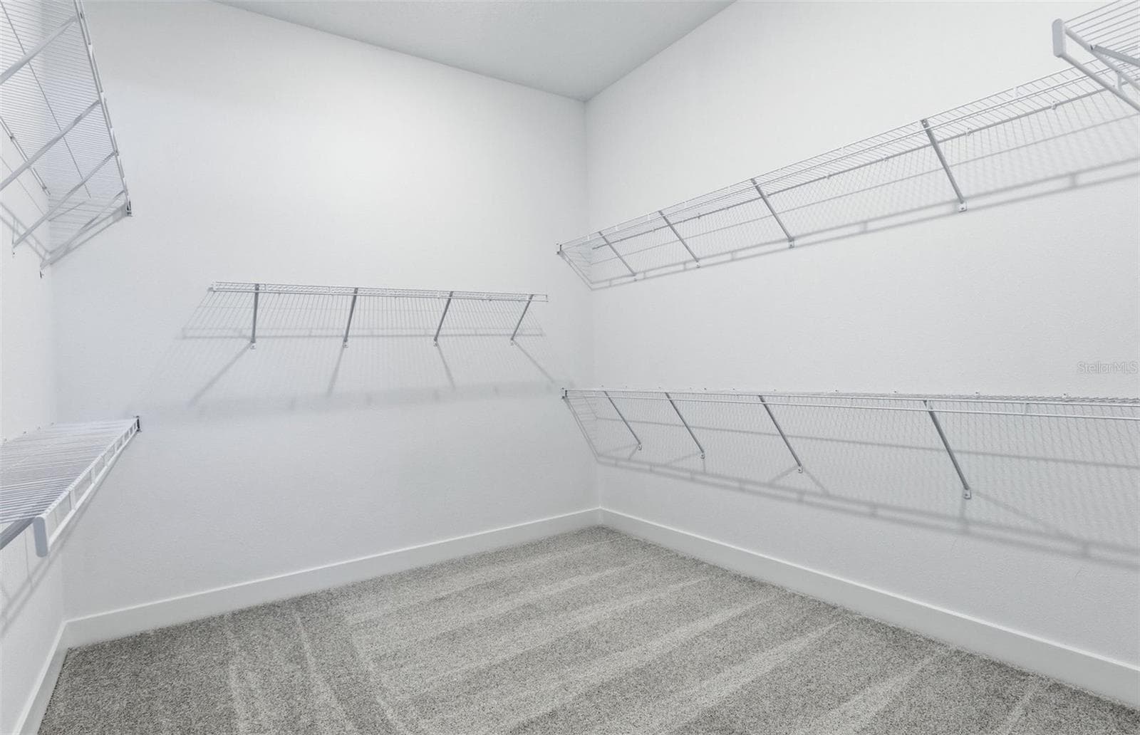 Owner's Walk-in Closet - 16694 HARVEST LEAF RD, SPRING HILL