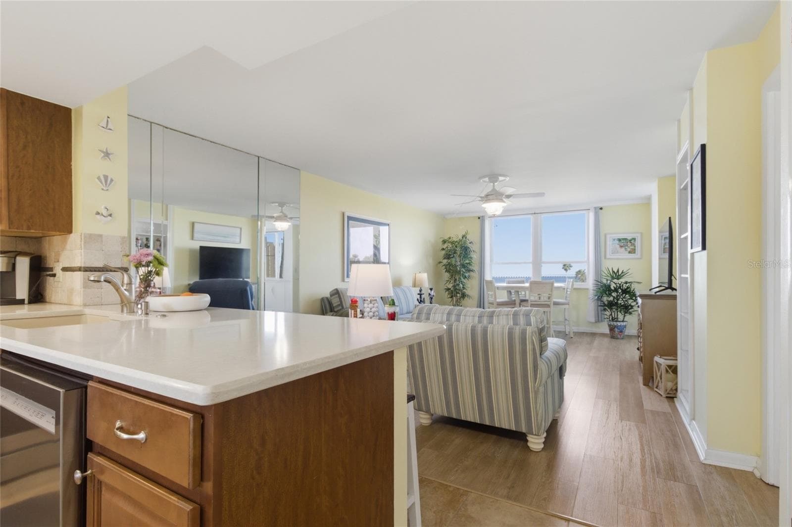 Kitchen with Living Room View - 2616 COVE CAY DR #502, CLEARWATER