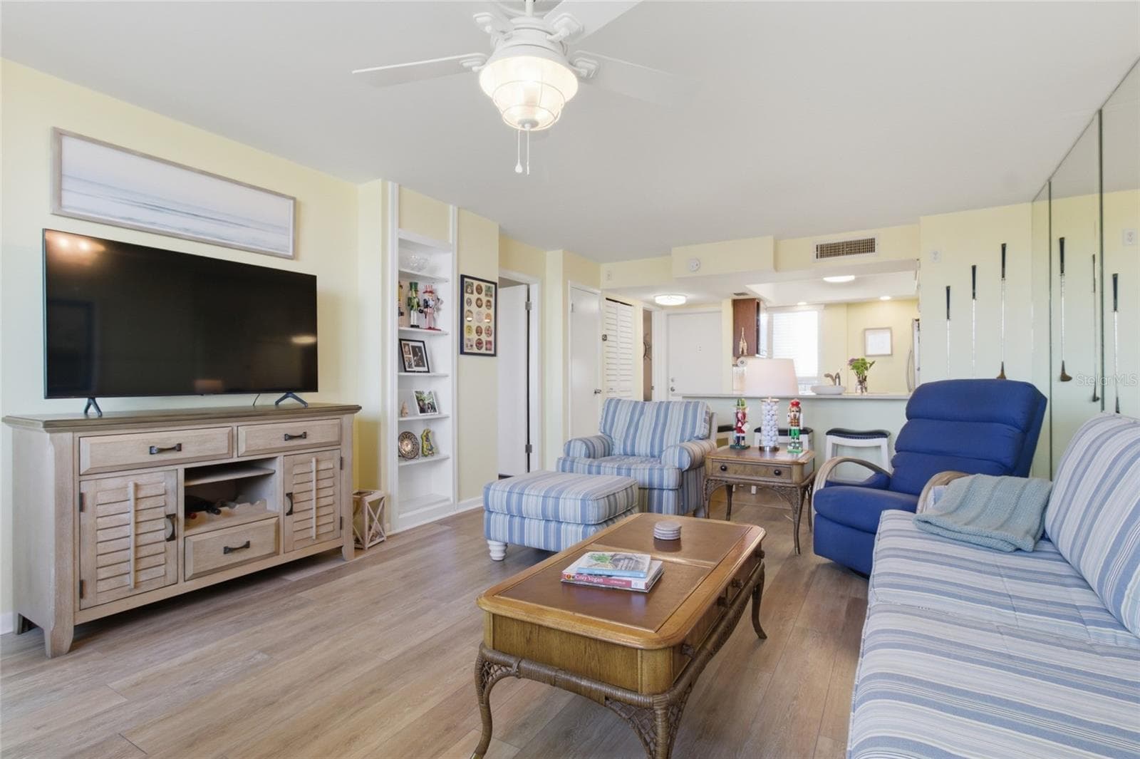 Living Room into kitchen with eat-in Counter Space - 2616 COVE CAY DR #502, CLEARWATER