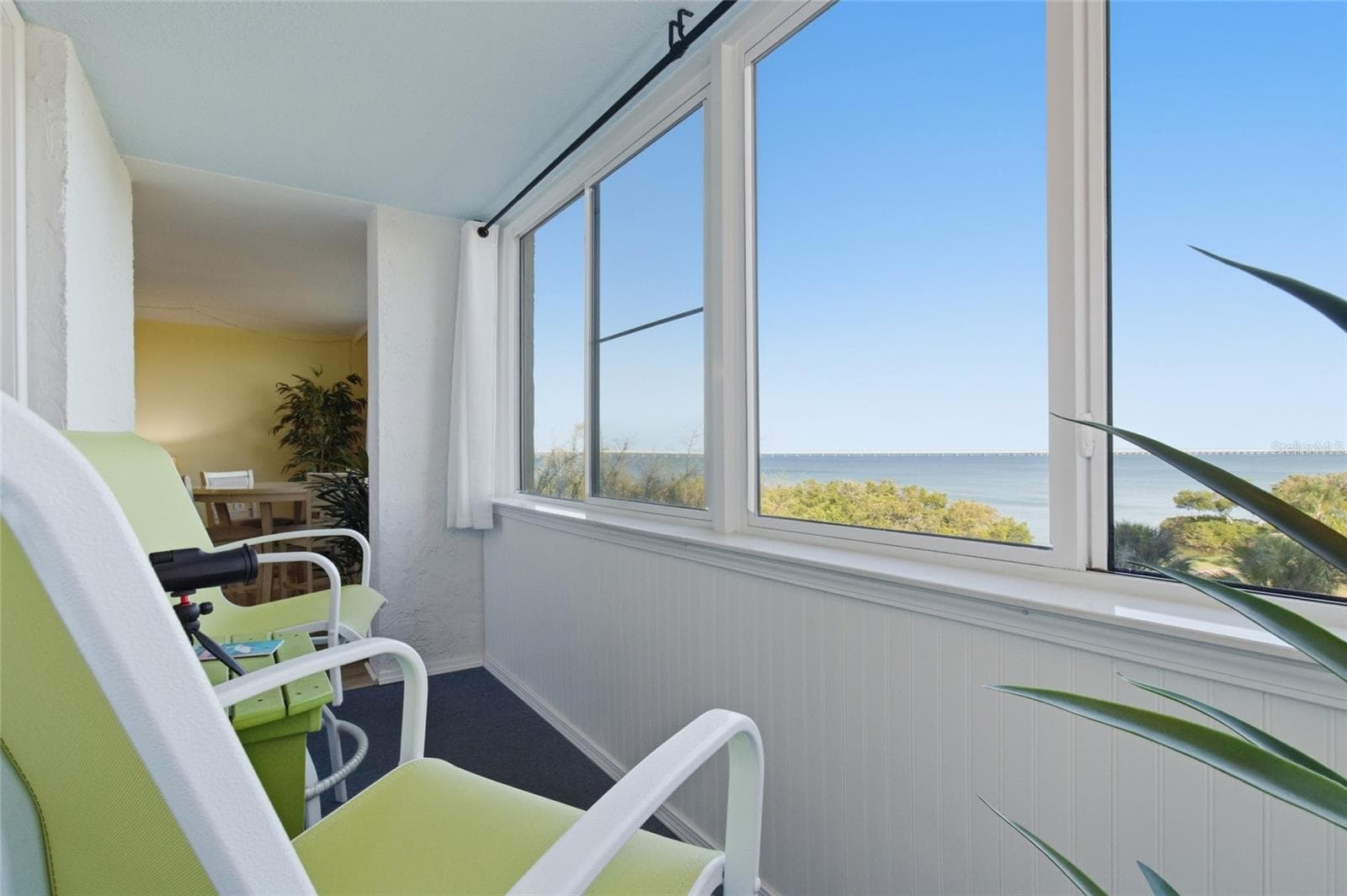 Enclosed/Air conditioned Lanai overlooking Tampa Bay and the 16th Hole! - 2616 COVE CAY DR #502, CLEARWATER