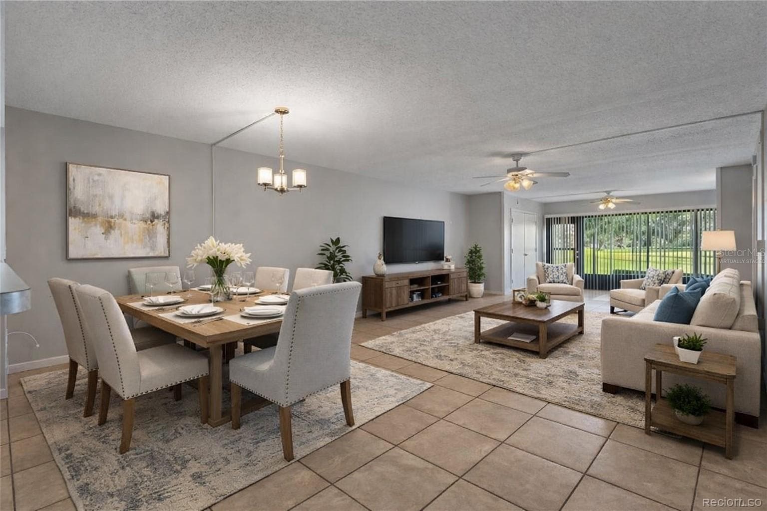 Virtually staged dining and living room - 3 CYPRESS RUN #35A, HOMOSASSA