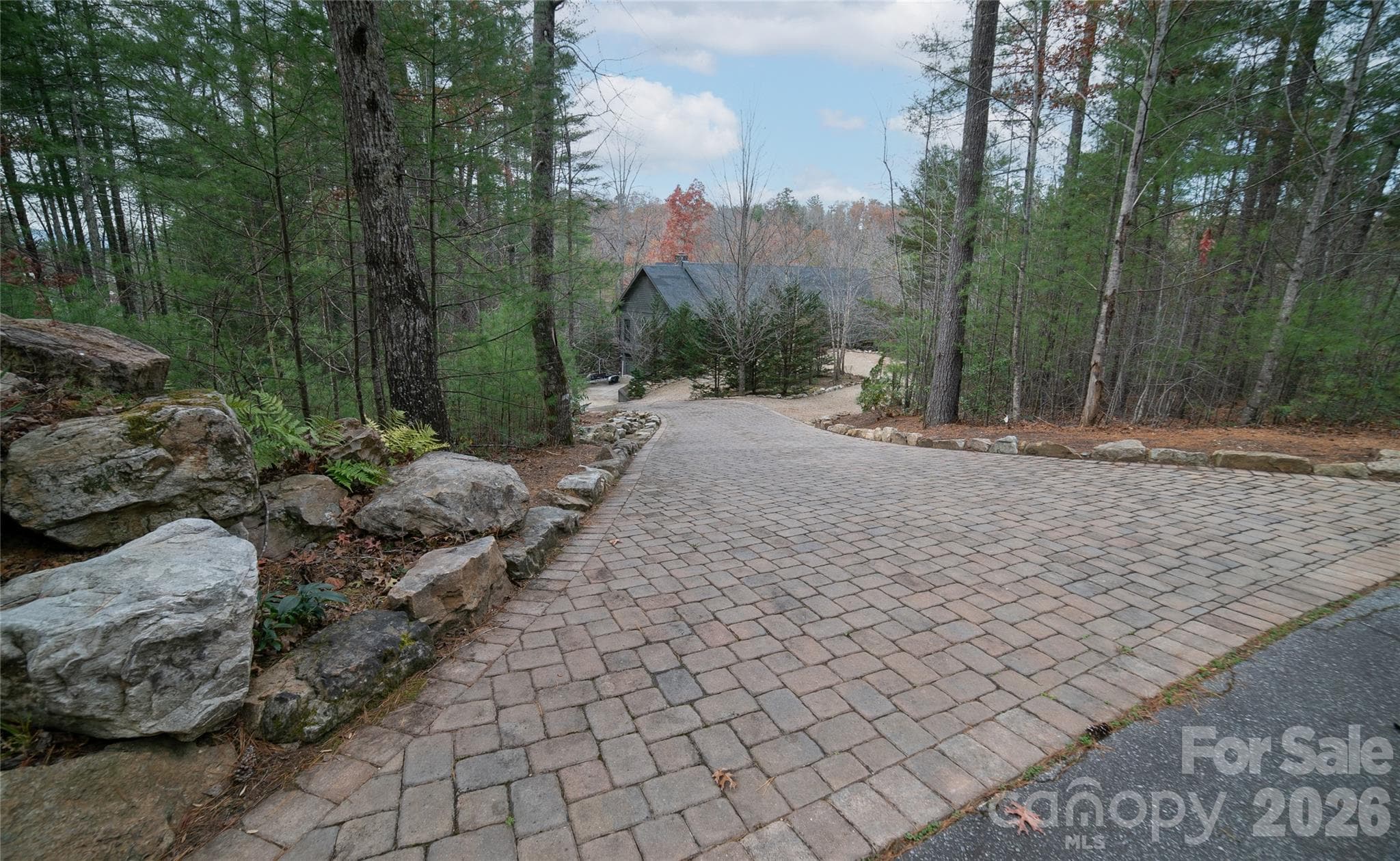 Custom landscaping and paver/gravel driveway - Nebo