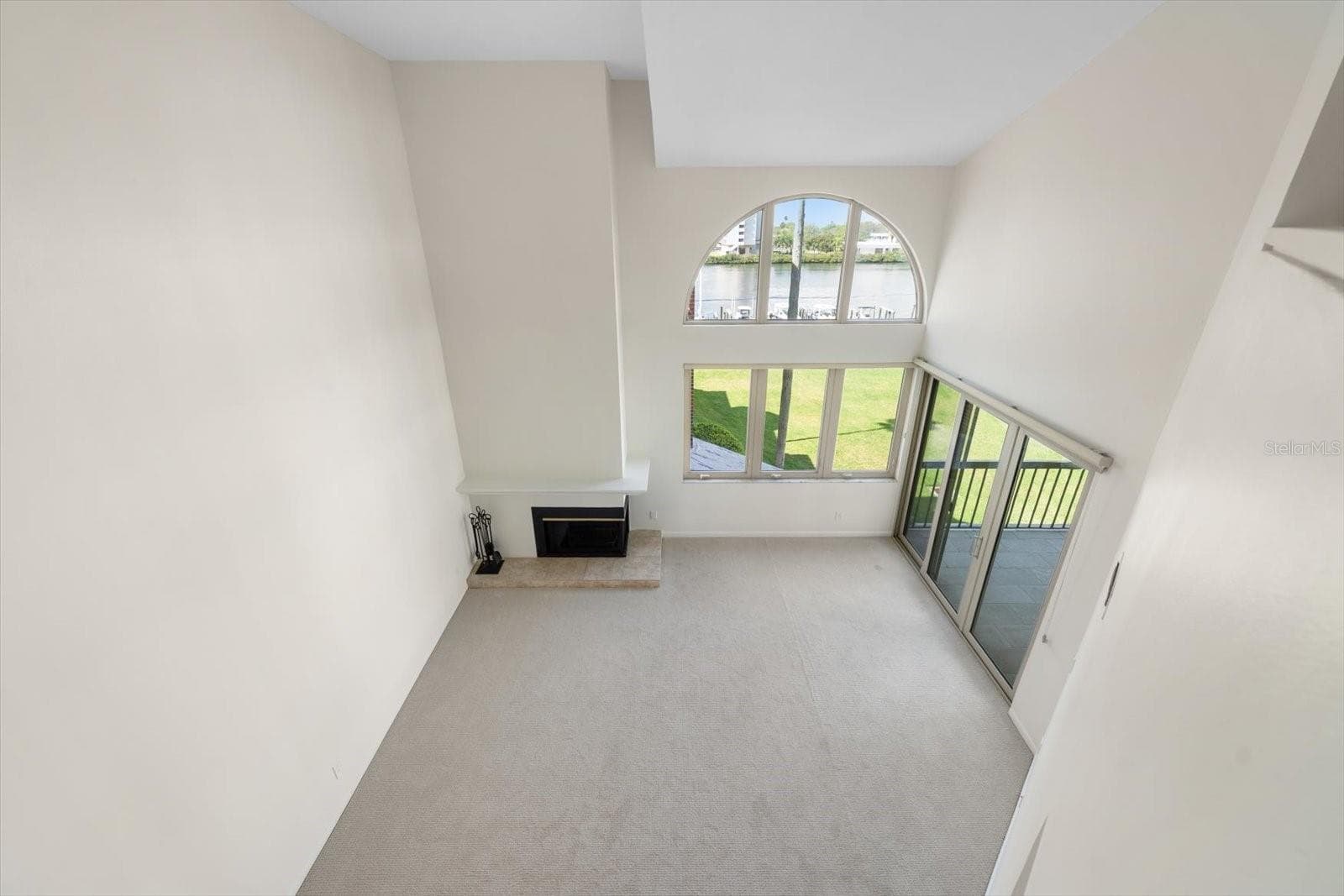 Looking down to living room from loft - 947 SEDDON COVE WAY #947, TAMPA