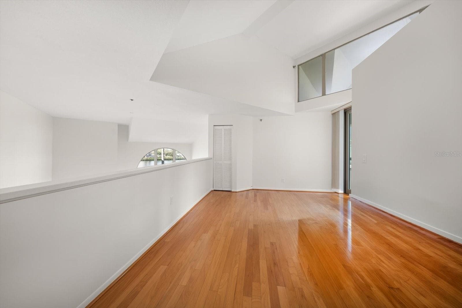 Looking down to living room from loft - 947 SEDDON COVE WAY #947, TAMPA