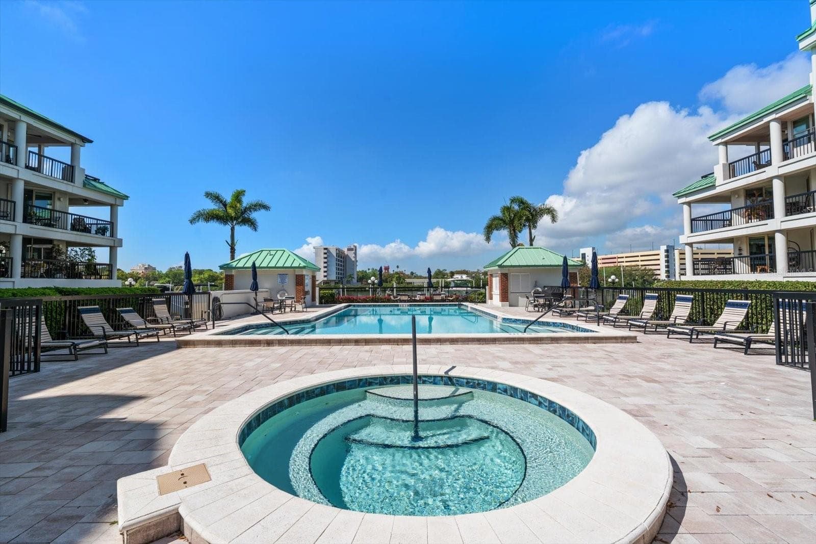 Seddon Cove spa with pool and water views in background - 947 SEDDON COVE WAY #947, TAMPA
