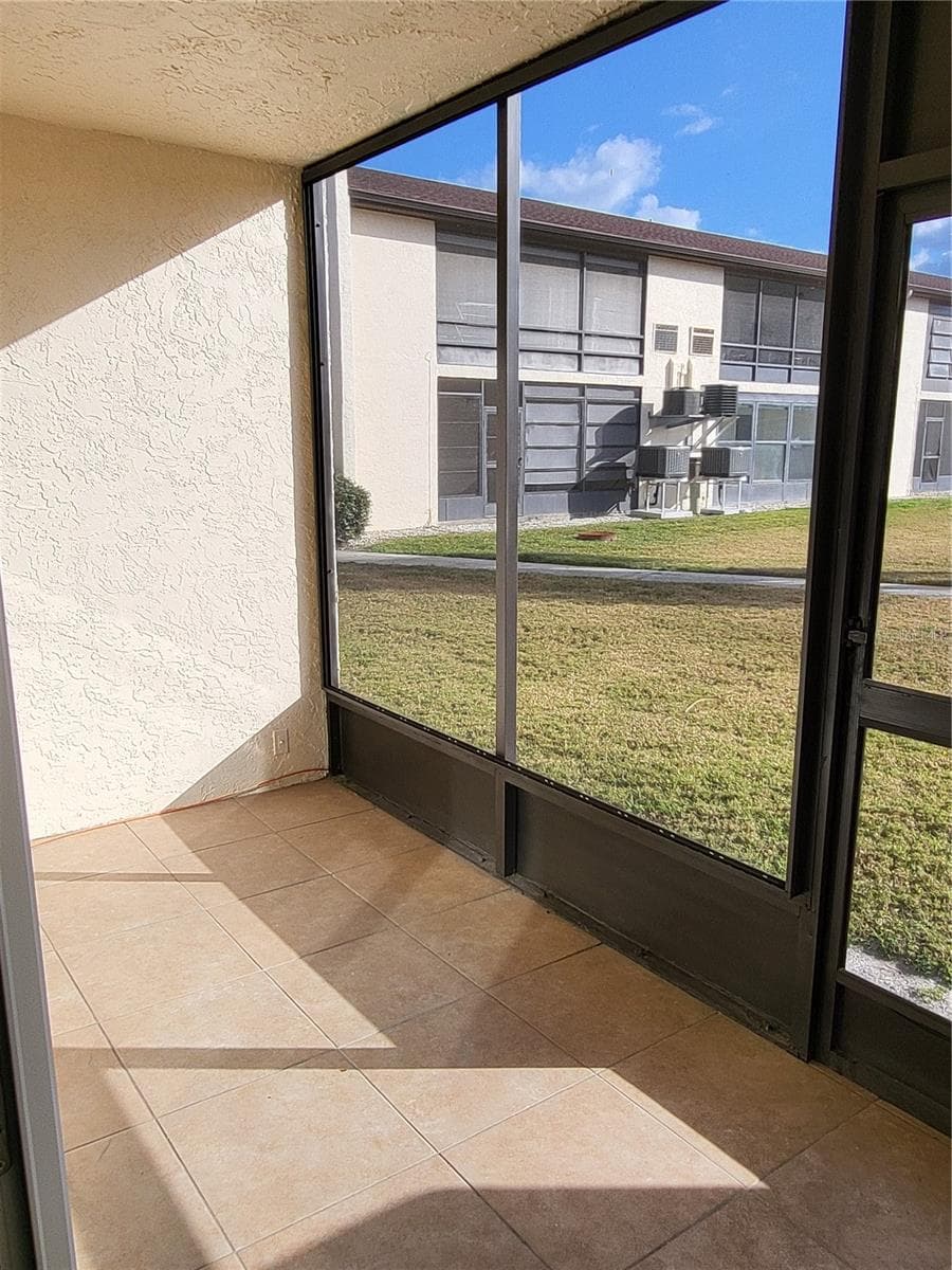 Screen room - 4956 HARBOR VILLA LN #103, NEW PORT RICHEY