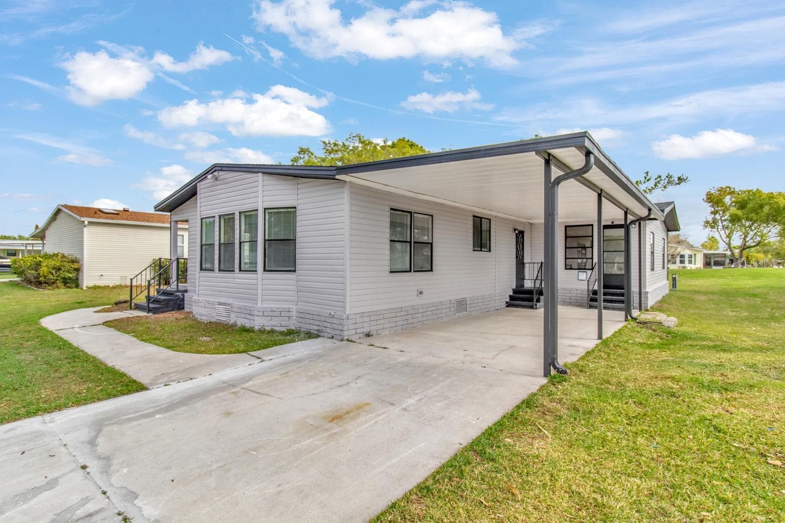 Manufactured Home at 217 ELLSWORTH DR, KISSIMMEE, photo 3 of 58