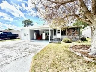 Manufactured Home at 194 ROSEWOOD DR, COCOA, photo 2 of 68
