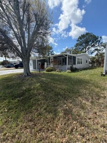 Manufactured Home at 194 ROSEWOOD DR, COCOA, photo 3 of 68