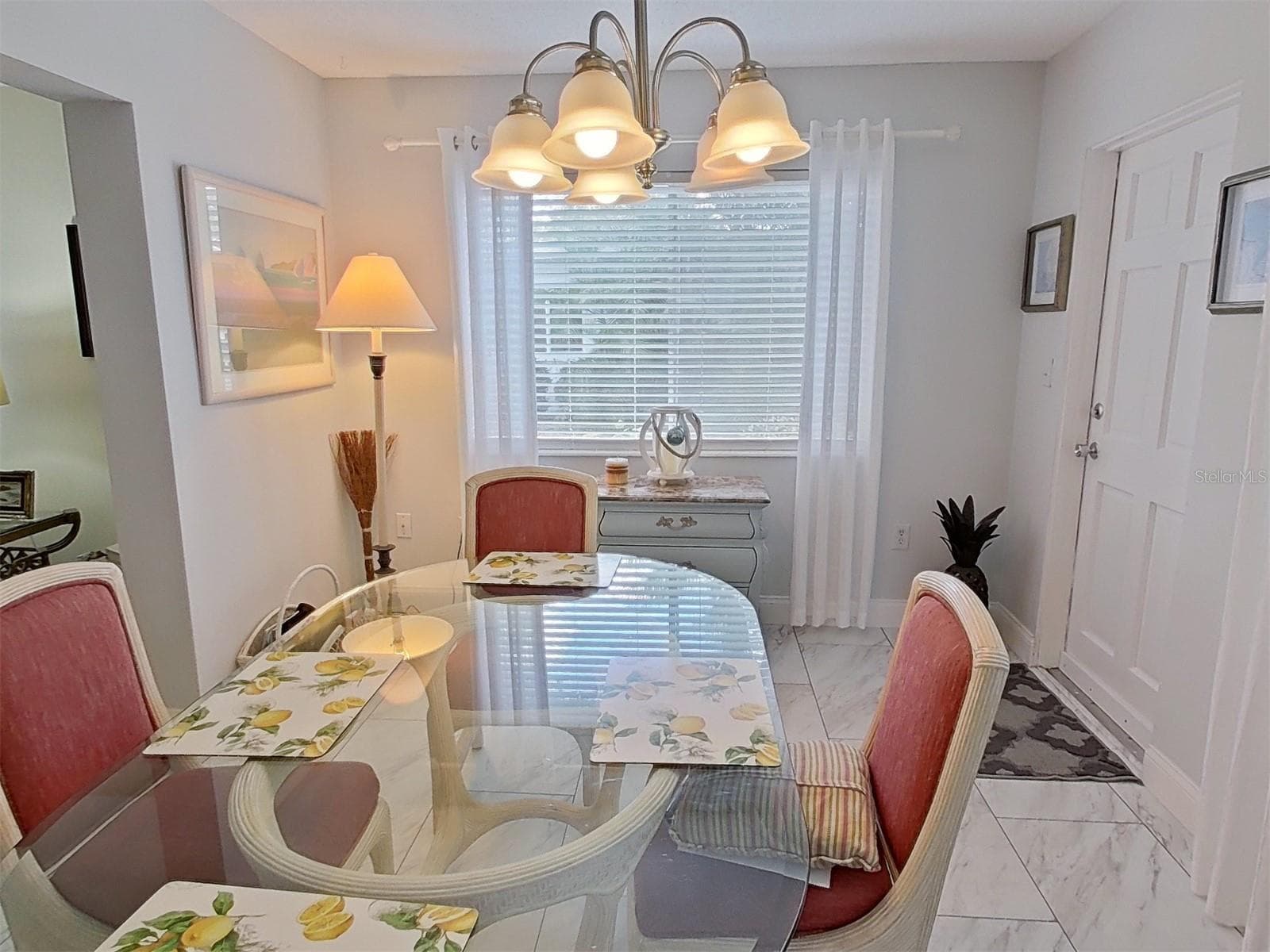 The door leading from the dining room to the patio makes dining alfresco a cinch! - 1845 VERA PL #29, SARASOTA