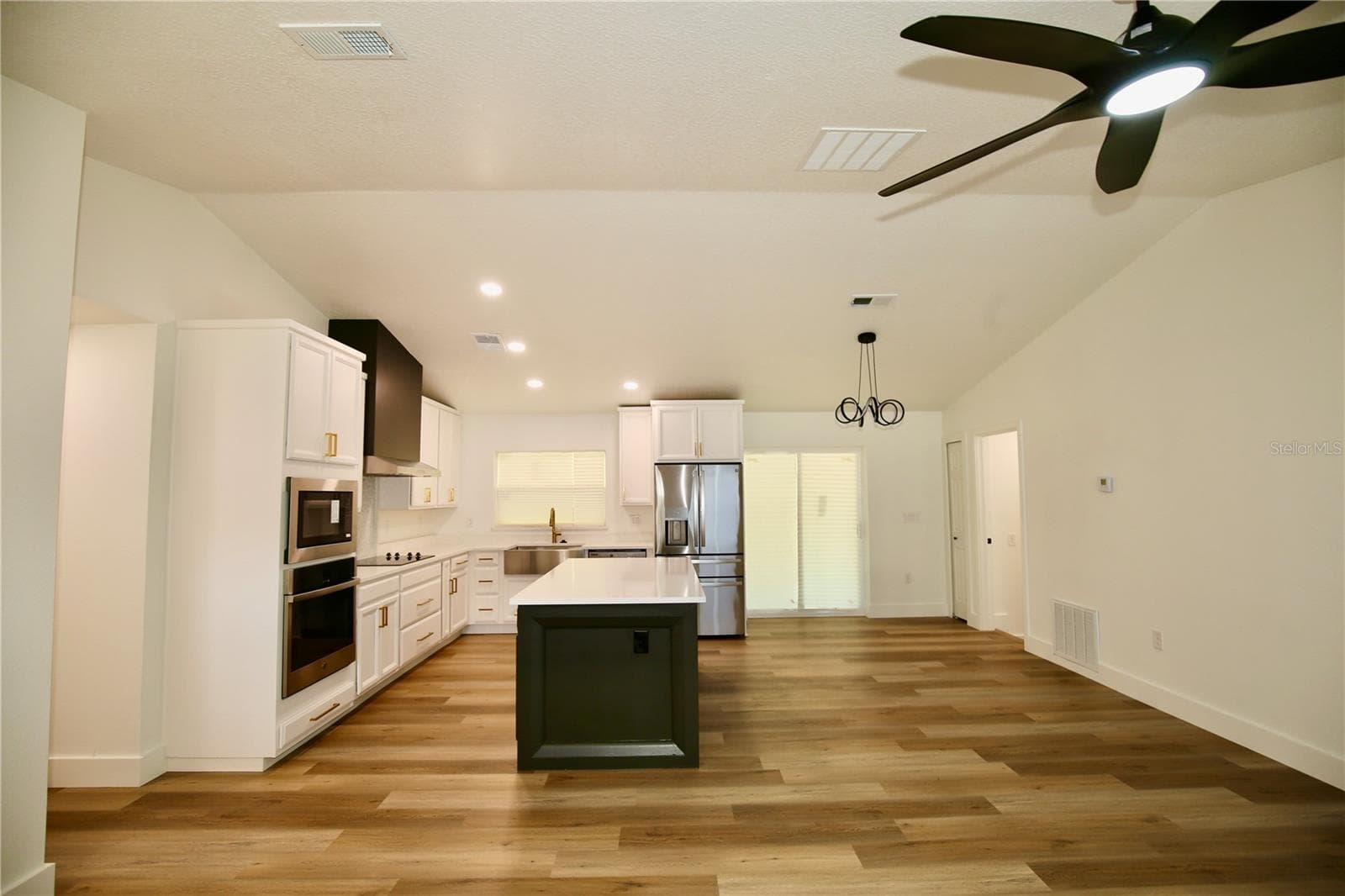 Kitchen view from Living Room - 2235 WAUTOMA PL, ORLANDO