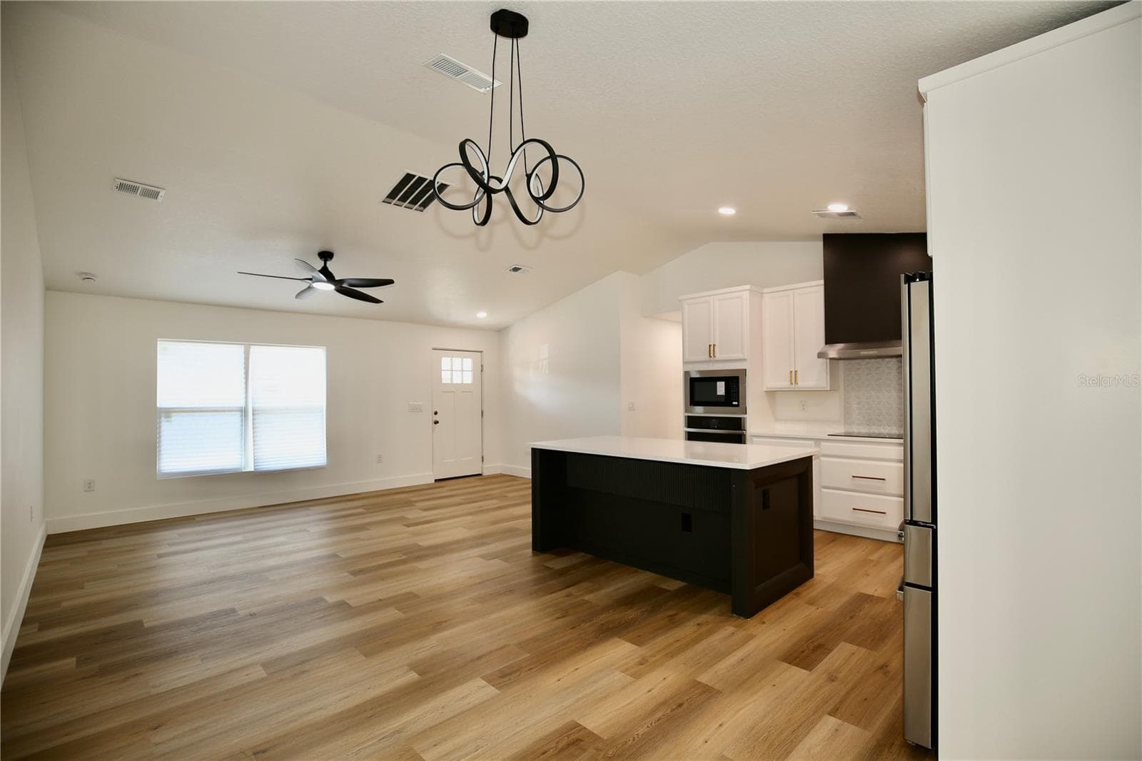Dinette look towards living room and kitchen - 2235 WAUTOMA PL, ORLANDO