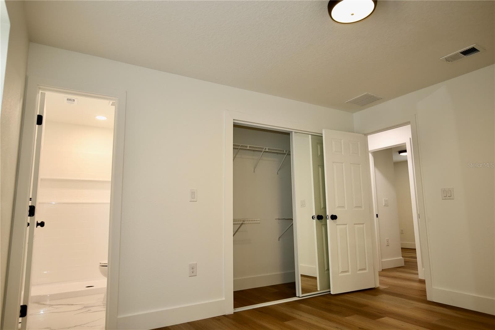 Primary Bedroom looking into Primary Bathroom. - 2235 WAUTOMA PL, ORLANDO