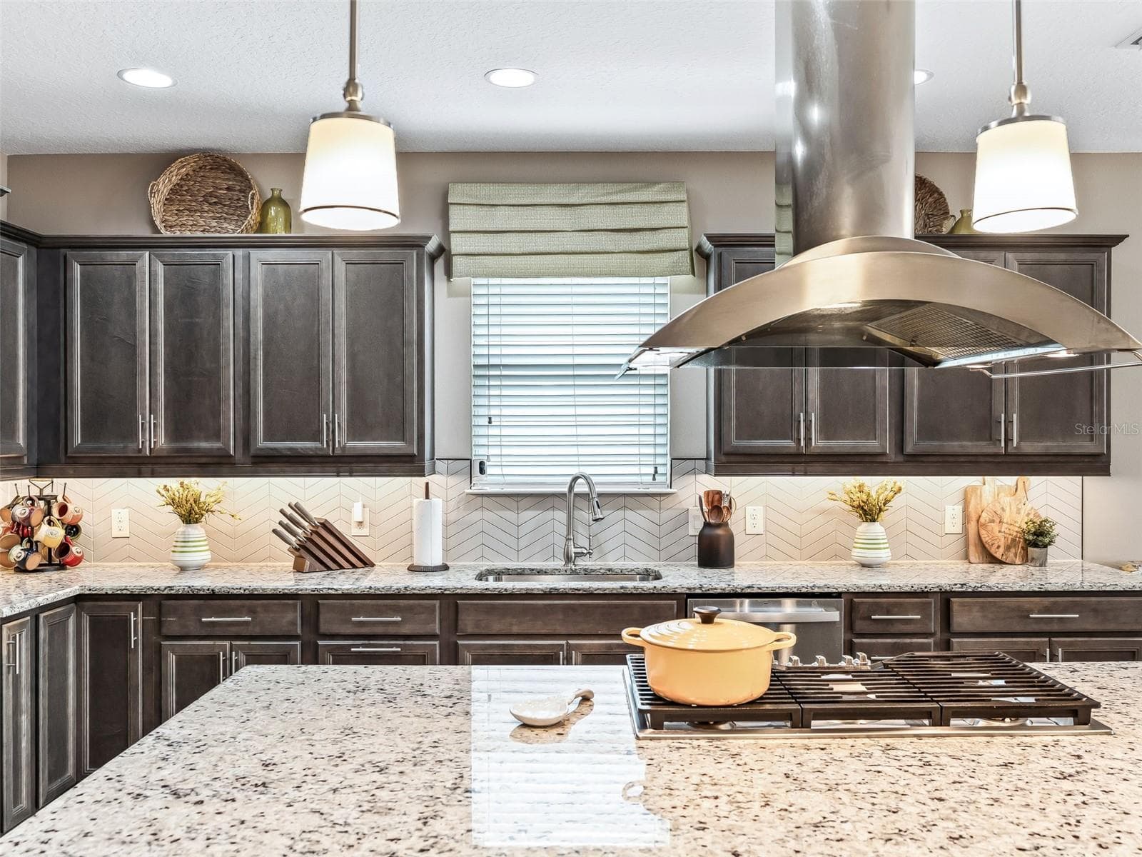 Fabulous Gourmet Kitchen with tons of cabinetry for storage, cabinet pantry, built-in refrigerator, pendant lighting, recess lighting and lazy susan! - 5662 NW 40TH LOOP, OCALA