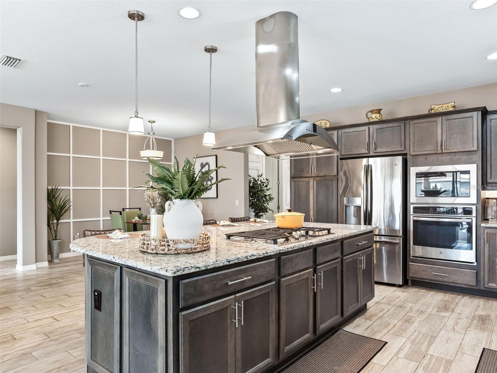 Gourmet Kitchen perfect for entertaining your family and friends. Open to the living room and dining room - 5662 NW 40TH LOOP, OCALA