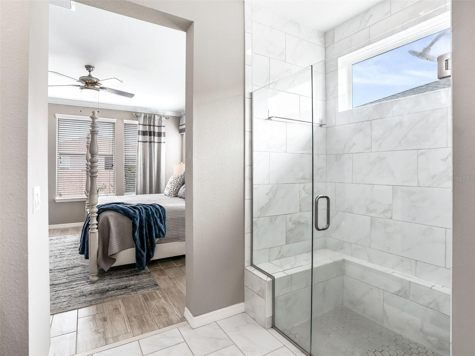 Ensuite with floor to ceiling tiled shower - 5662 NW 40TH LOOP, OCALA