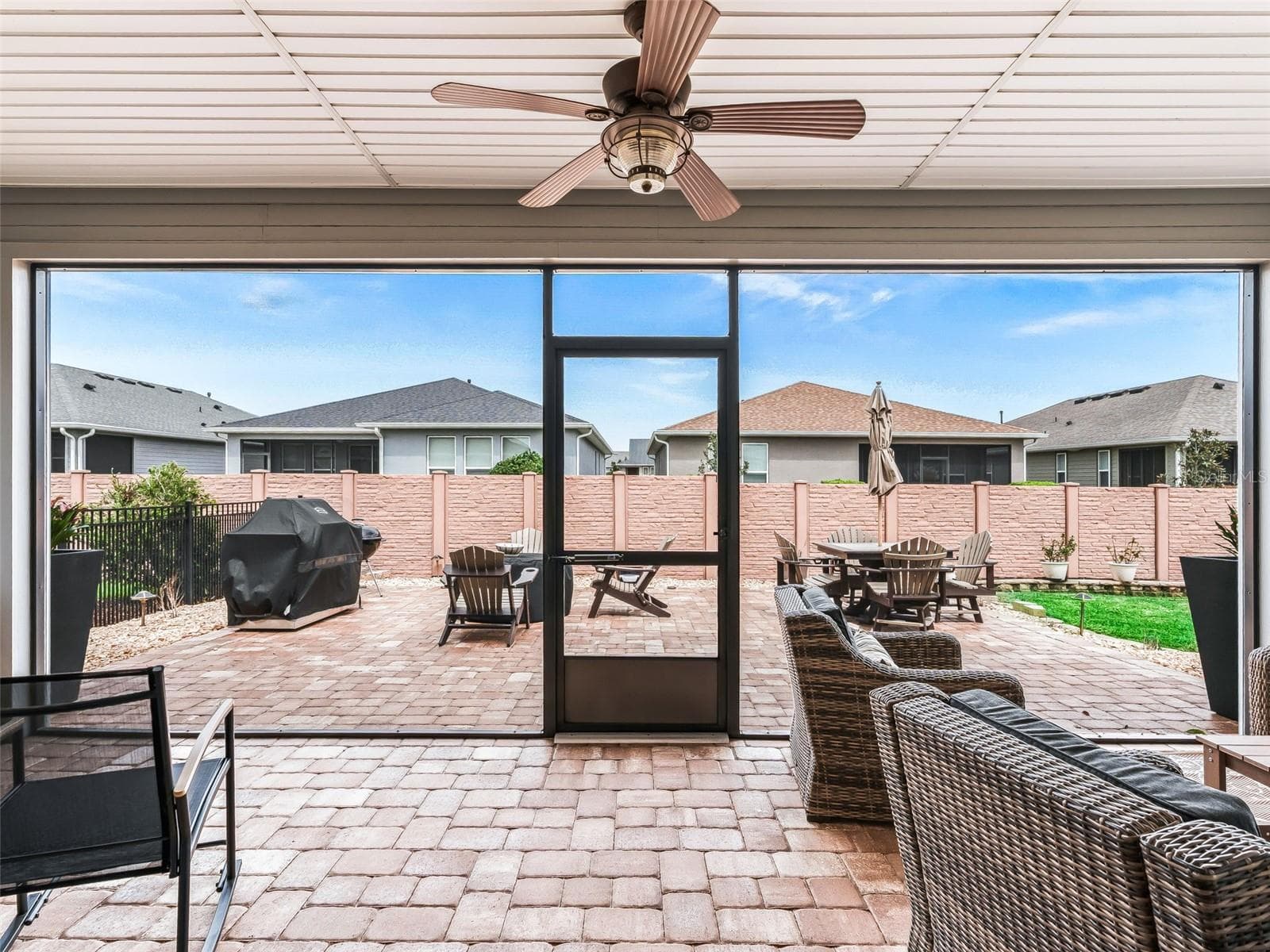Covered lanai with pavers - 5662 NW 40TH LOOP, OCALA