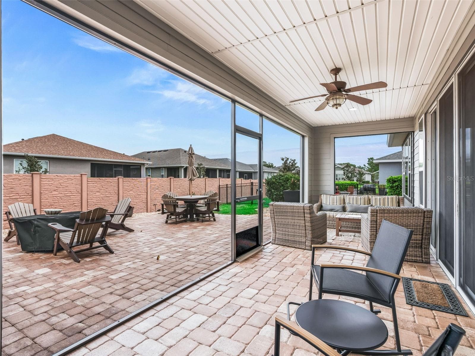 Covered lanai with pavers - 5662 NW 40TH LOOP, OCALA