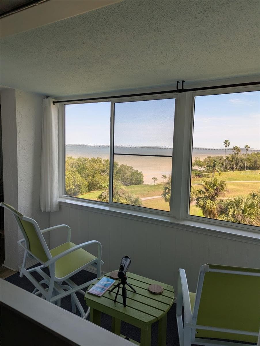 Enclosed/Air conditioned Lanai overlooking Tampa Bay and the 16th Hole! - 2616 COVE CAY DR #502, CLEARWATER