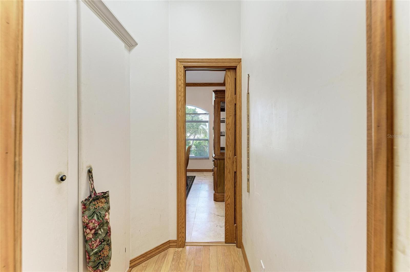 Extra pantry at left in walk through from kitchen to dining room - 7604 52ND TER E, BRADENTON