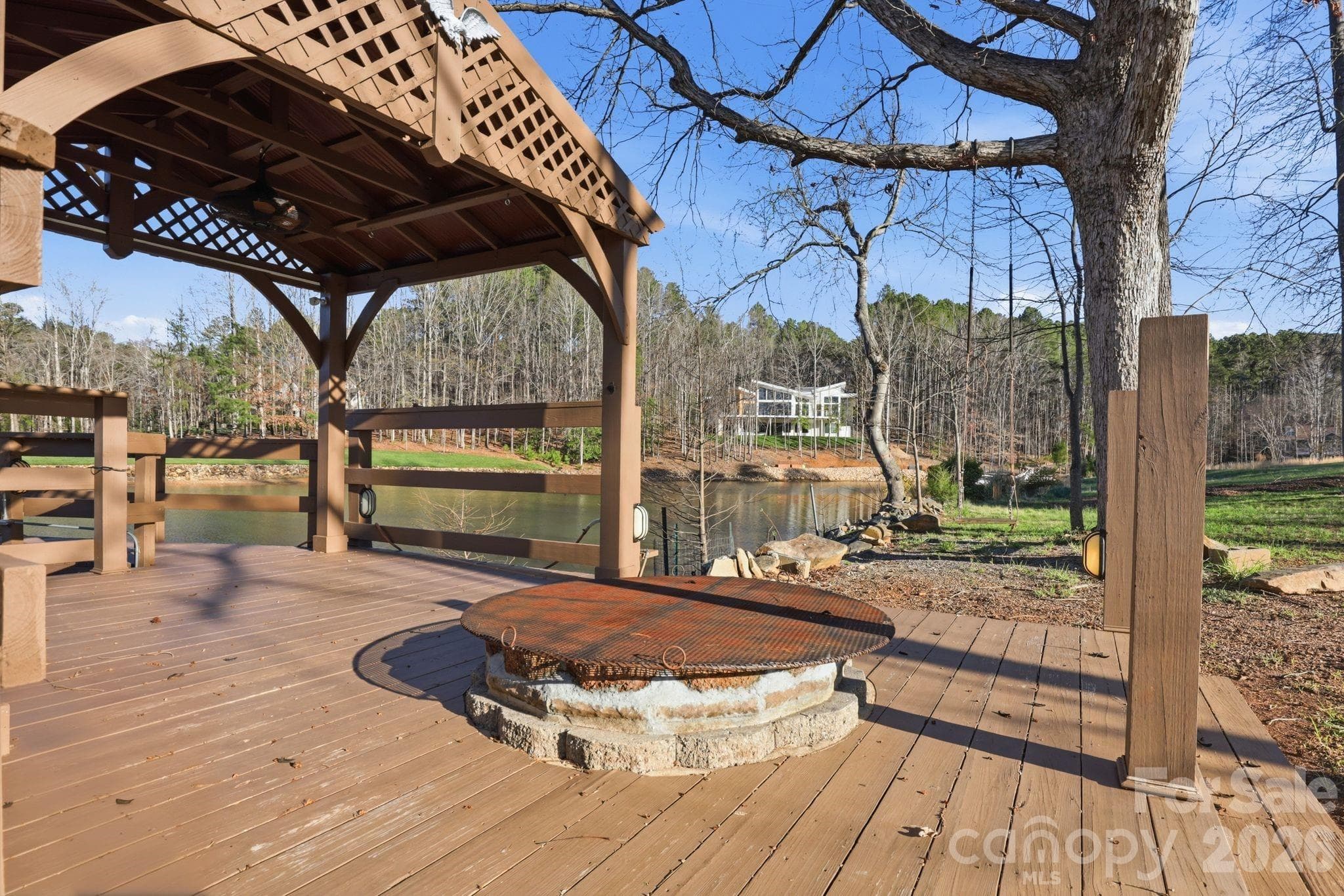 Landing area with fire pit. - Troutman