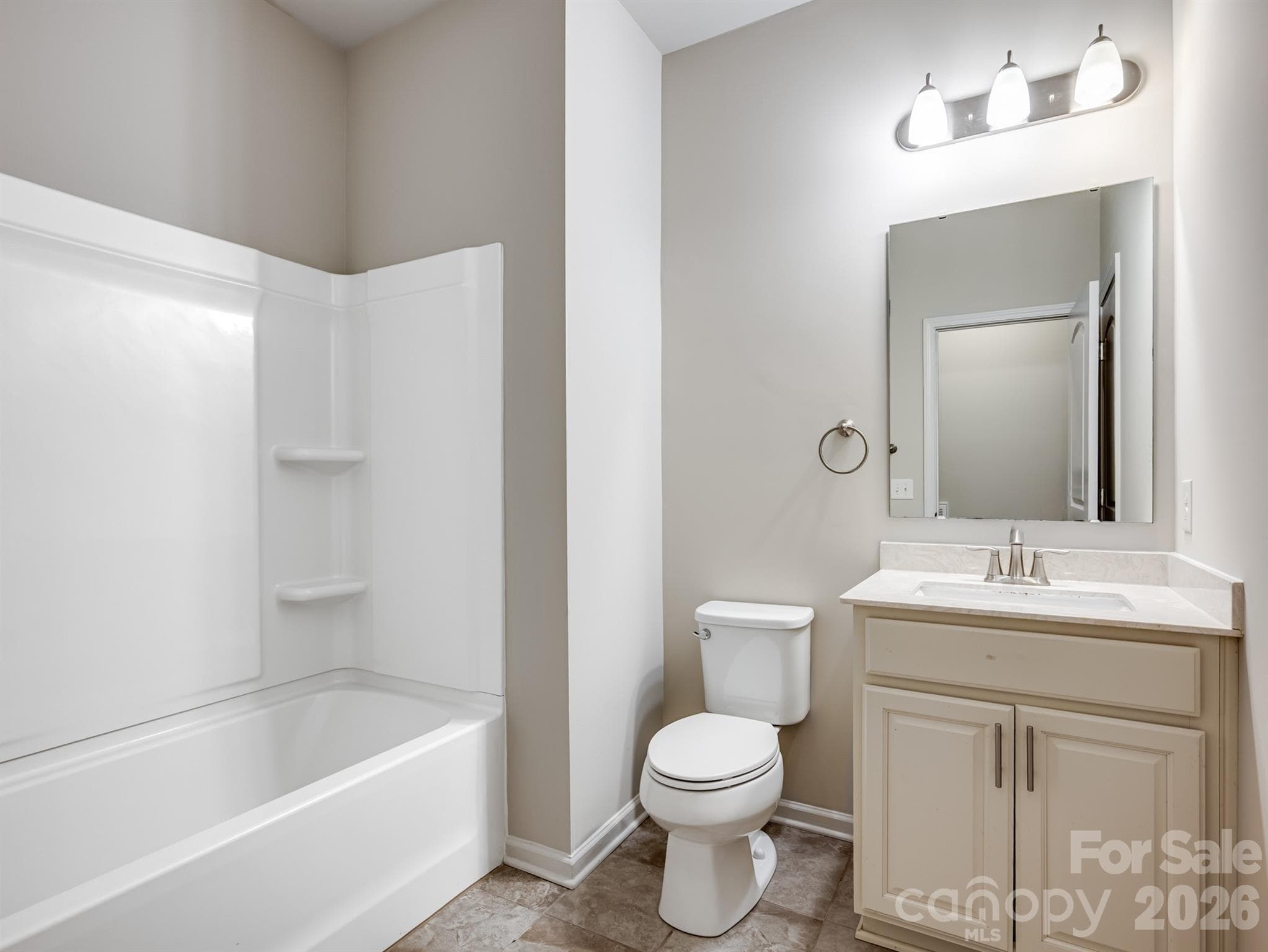 Full bathroom on main floor. Accessible from bedroom and hallway. - Charlotte