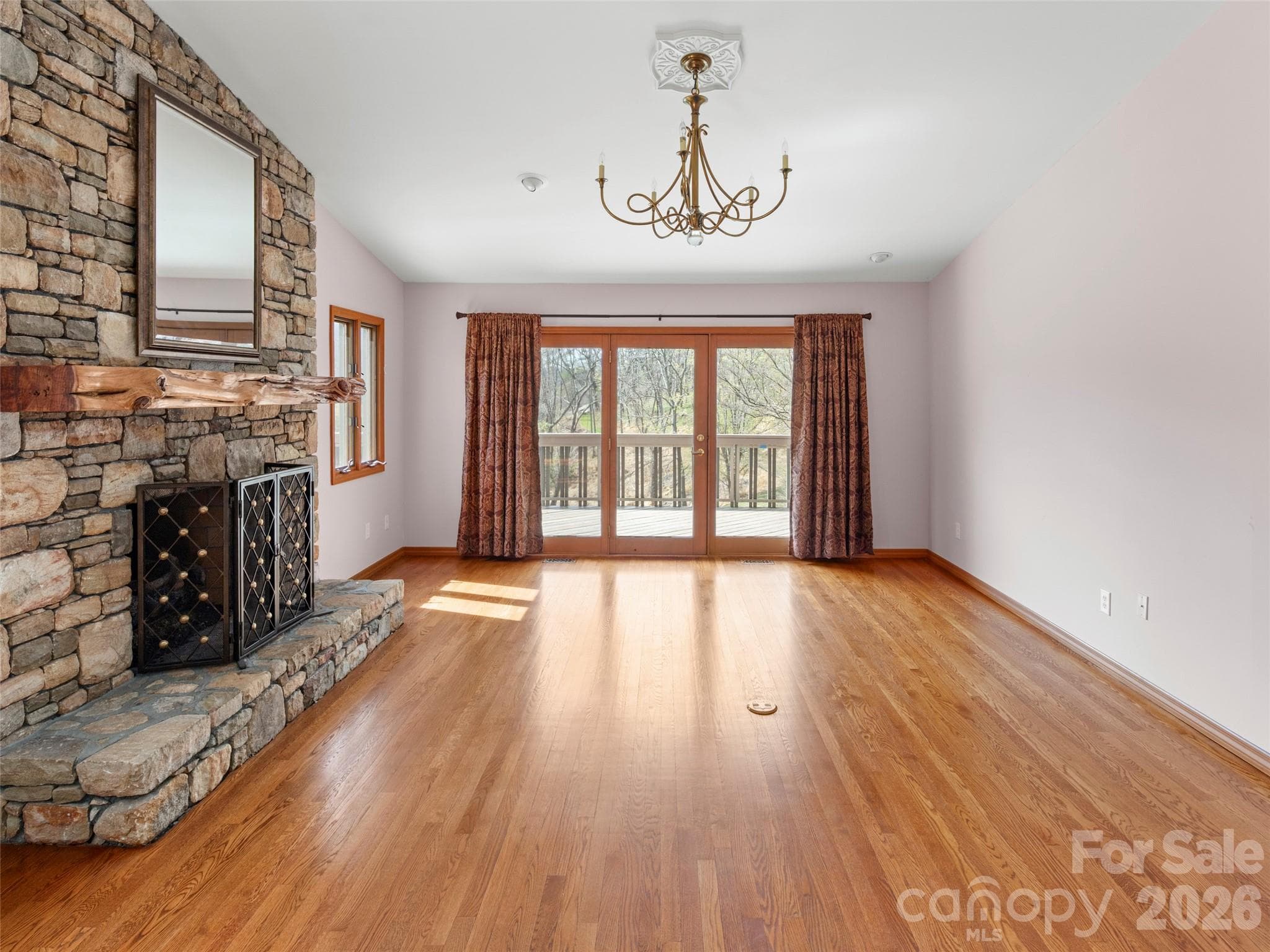 View from the main level living room to deck access - Asheville