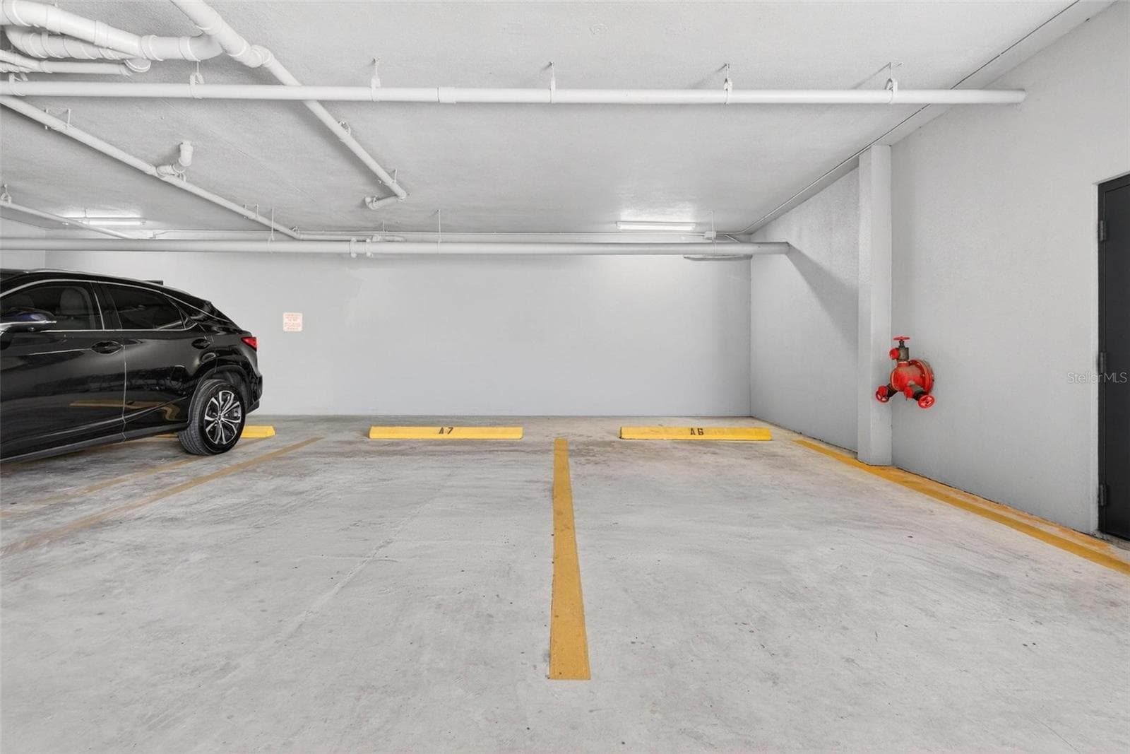 RARE 2 designated parking spaces - 14820 RUE DE BAYONNE #302, CLEARWATER